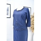 Ошатна синя сукня з прикрасами